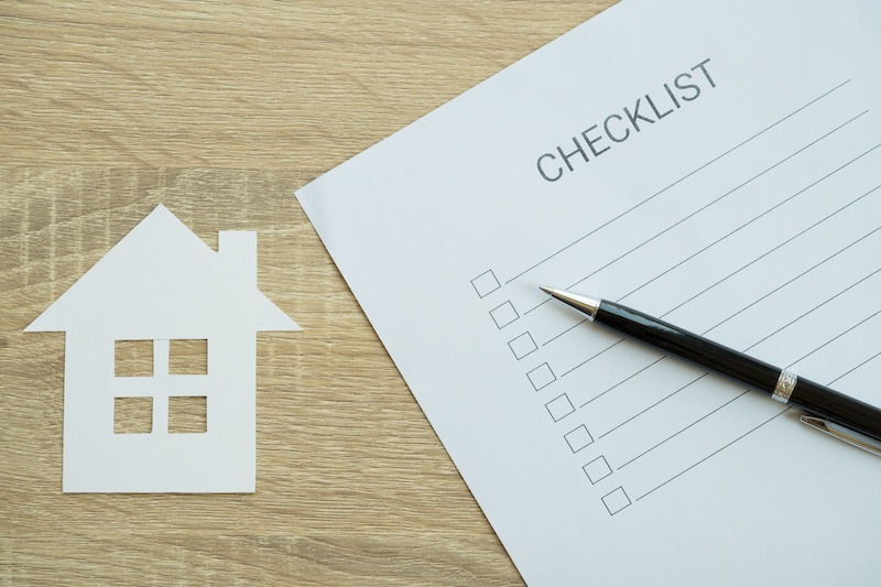 Home inspection checklist. Close up of checklist with house inspection - to do list