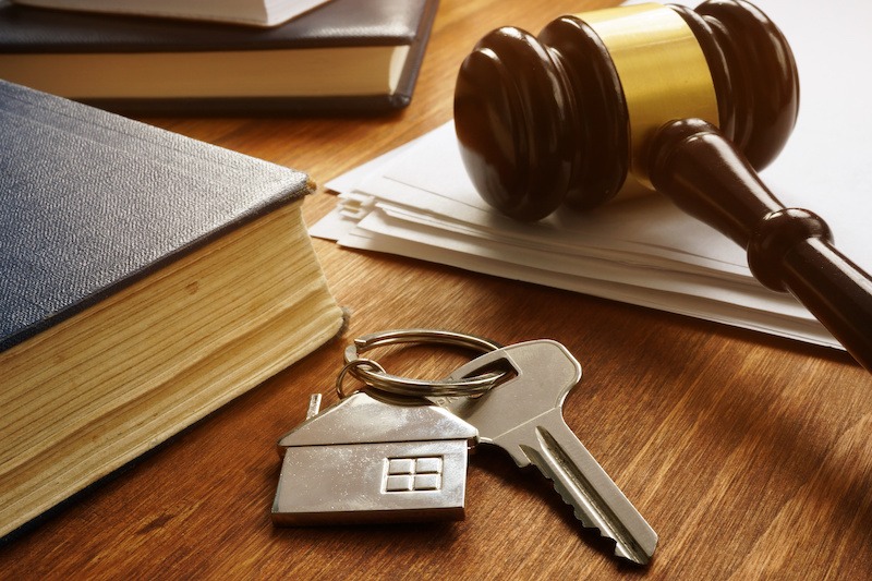 Home purchase deal fell through. Property law concept. Key from real estate and gavel.