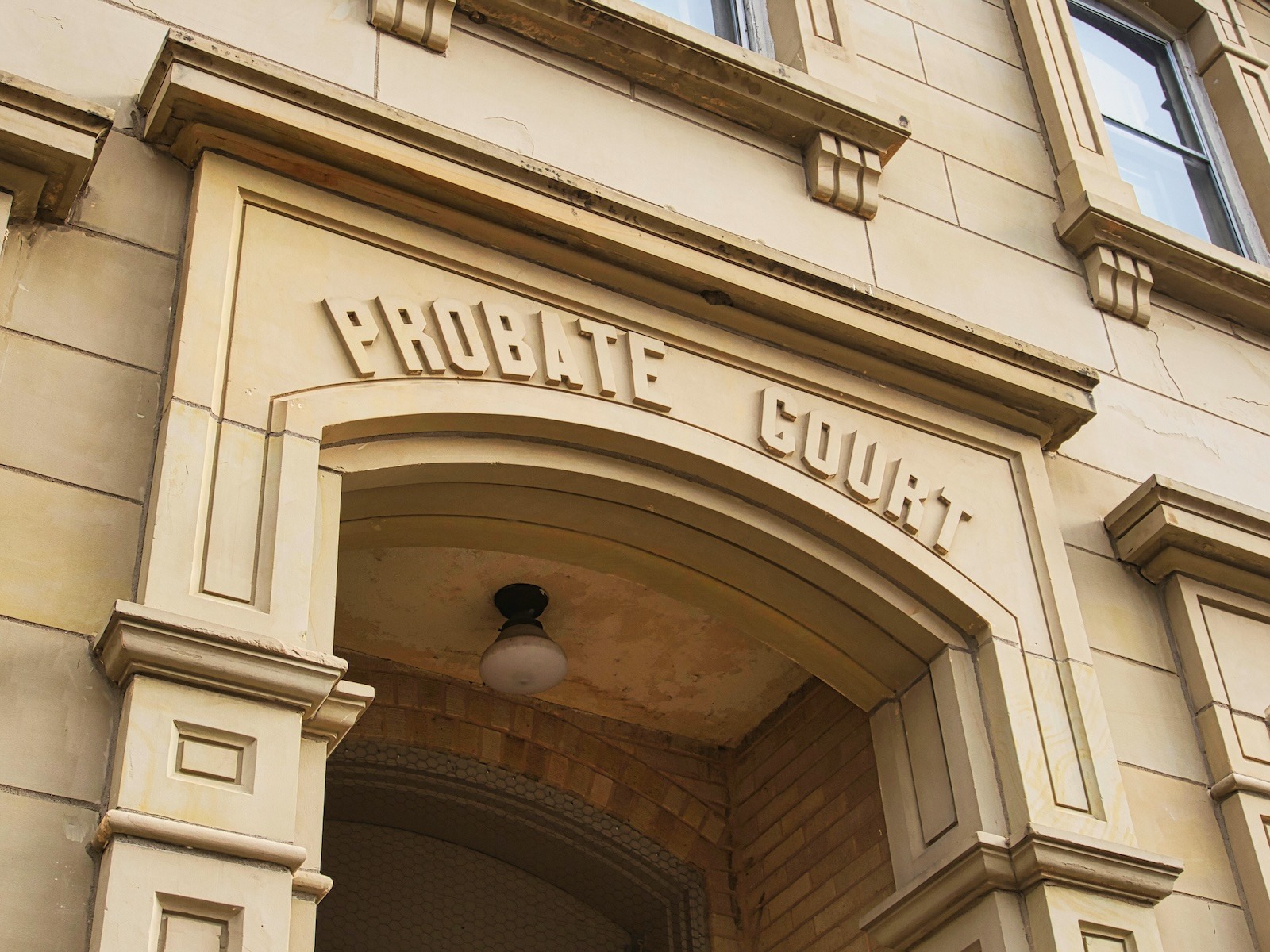 Estate Planning. What is Probate? An image of an olde court building with ‘PROBATE COURT’ written at the top of a tall arched entrance.